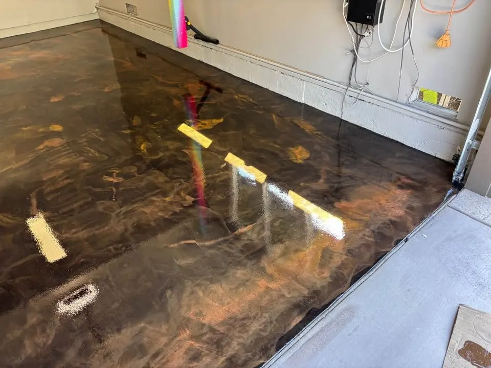 Dark metallic epoxy garage floor by Vazquez Epoxy Coatings, serving Rancho Cordova, CA